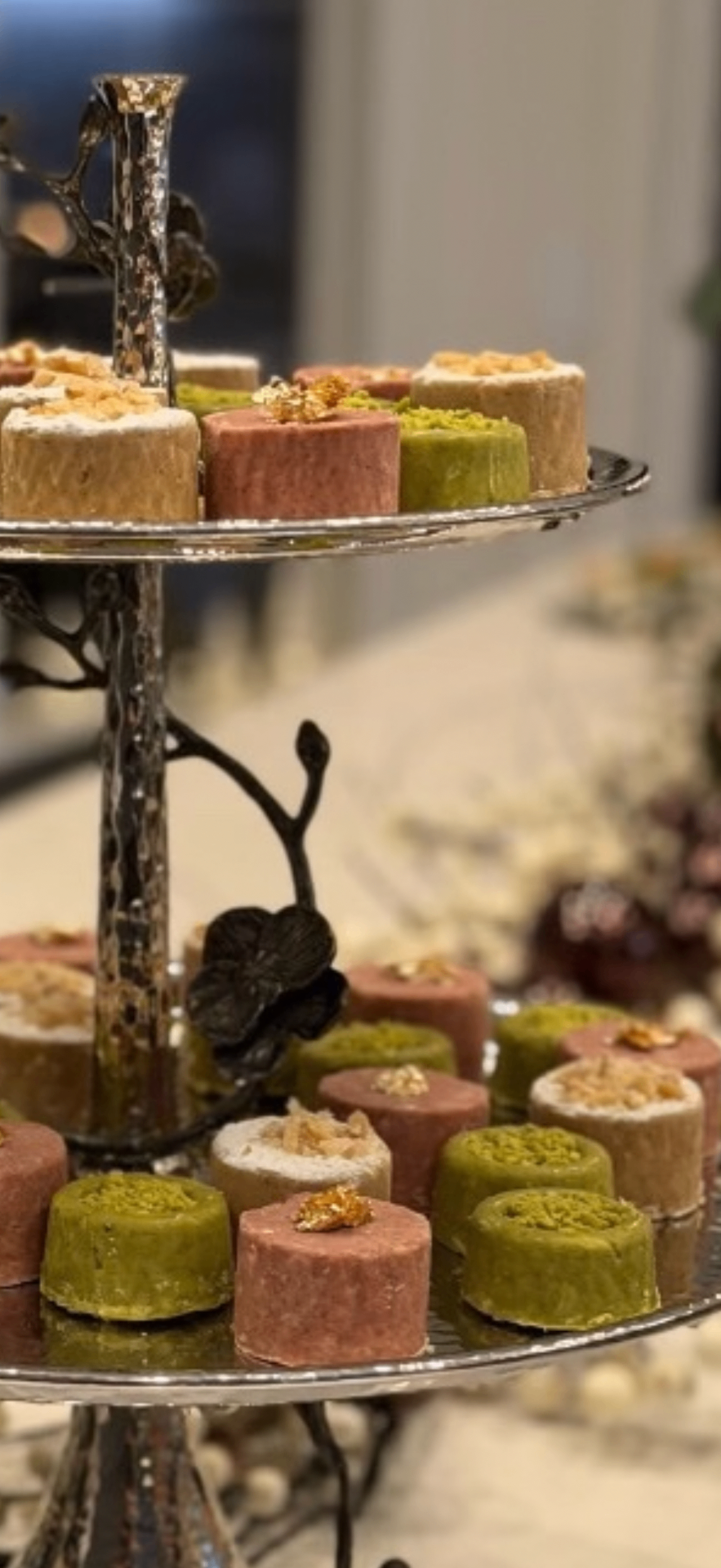 Persian petit fours on a tiered silver stand